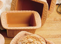 Romertopf companion clay baking pieces and loaf pans for bread, fish, garlic, and specialty kitchen use
